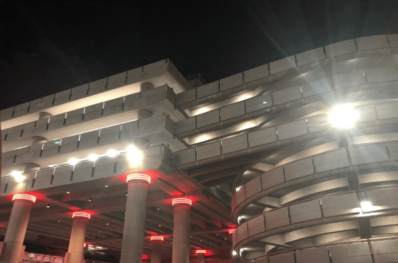 large illuminated parking garage at night