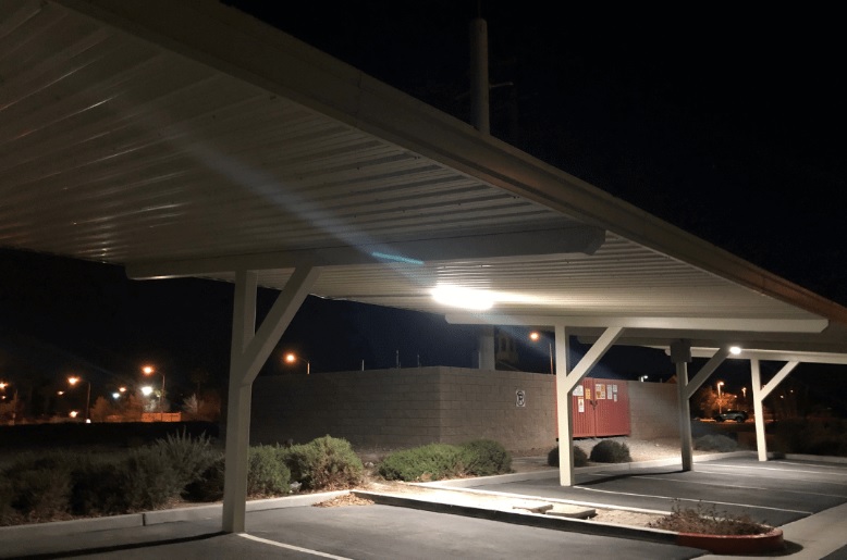parking lot with roof illuminated at night
